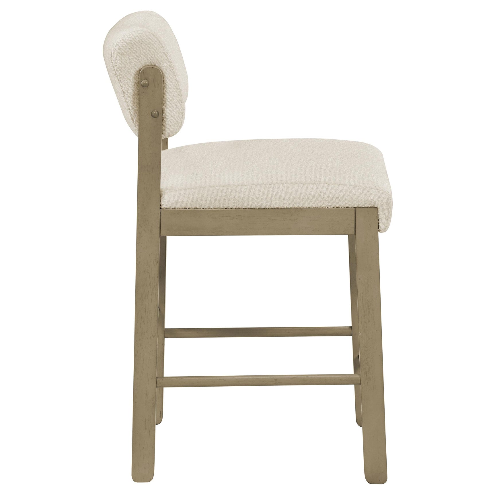 Rubberwood legs with footrest stretchers detail on Kehoe upholstered chair