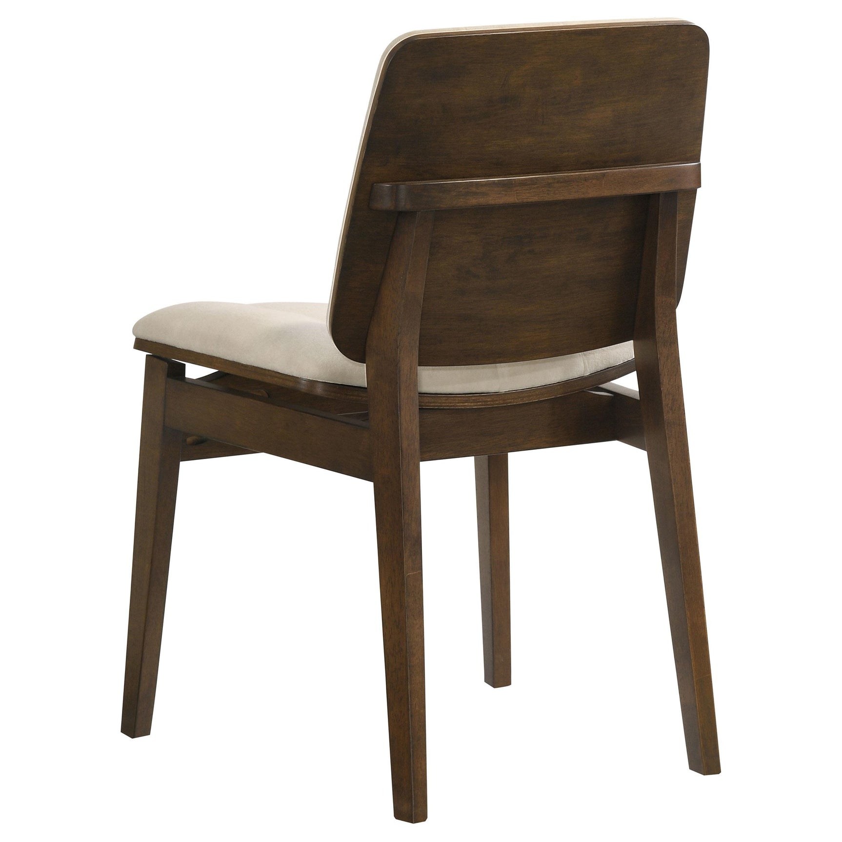 Tapered walnut legs of Redbridge velvet upholstered dining chair
