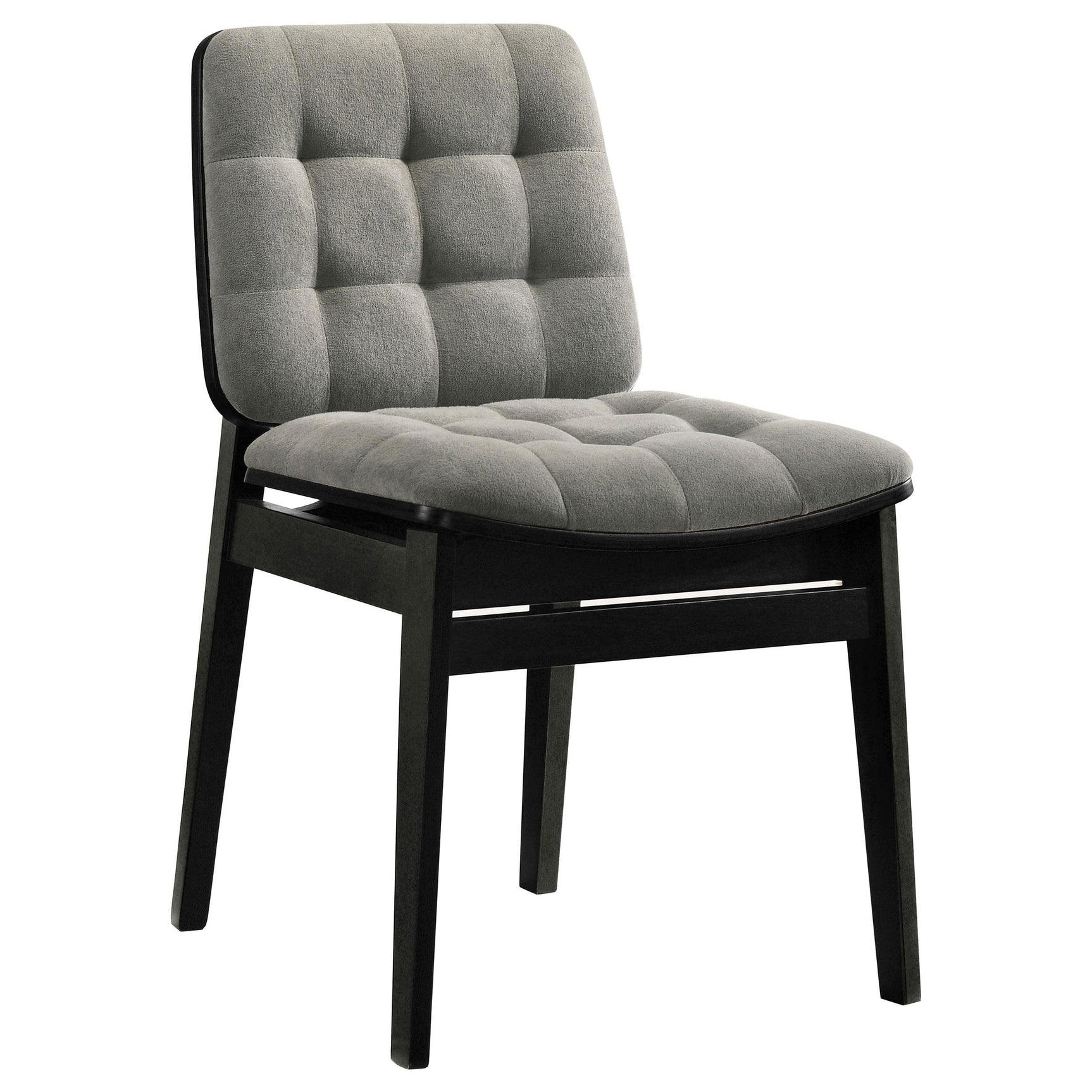 Side view of Redbridge chair showing channel-tufted velvet upholstery and tapered legs