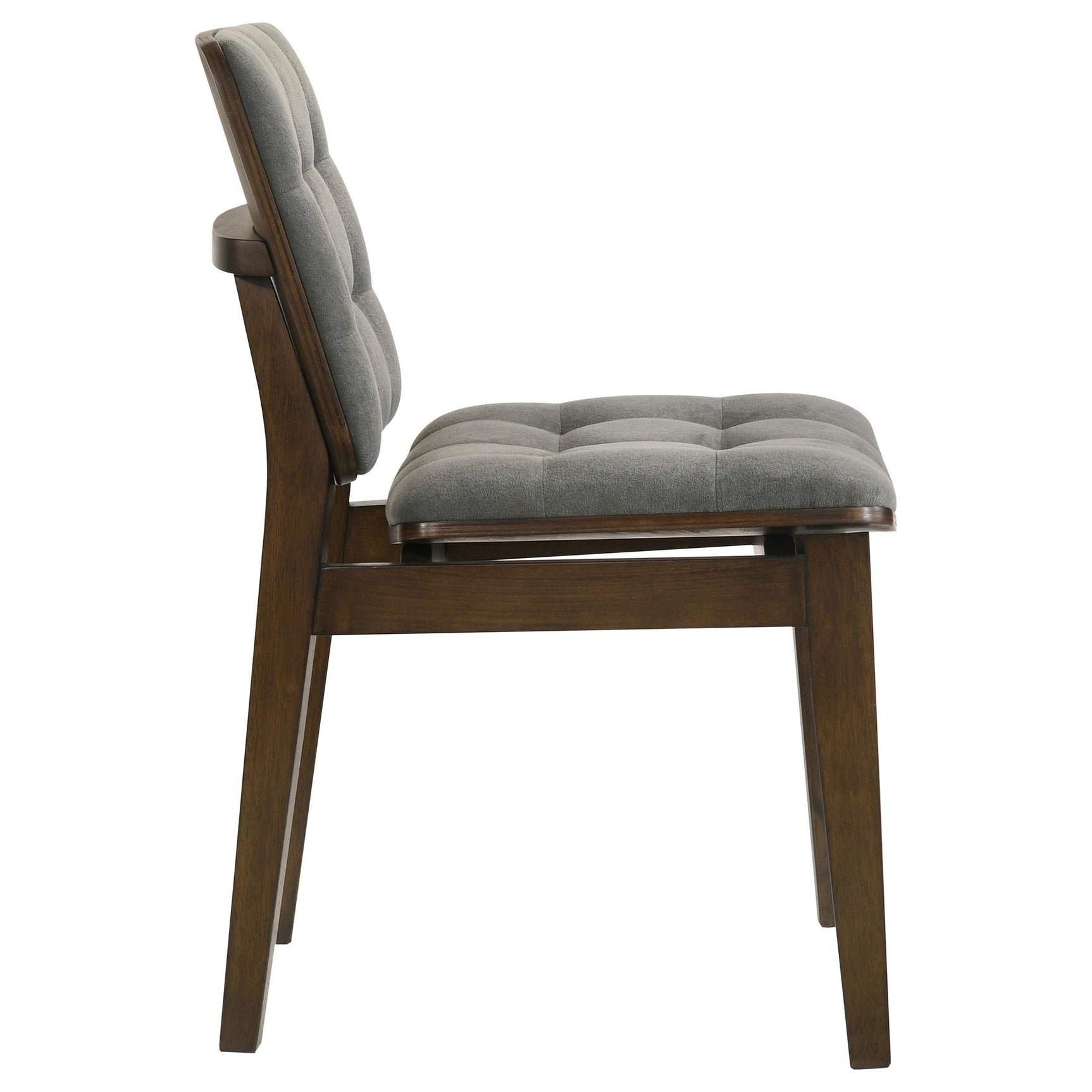 Dining room setup with Redbridge side chairs in grey velvet and walnut table