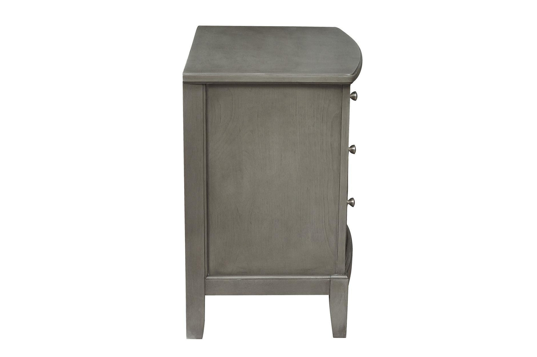angled view of Cotterill gray tufted bedroom furniture