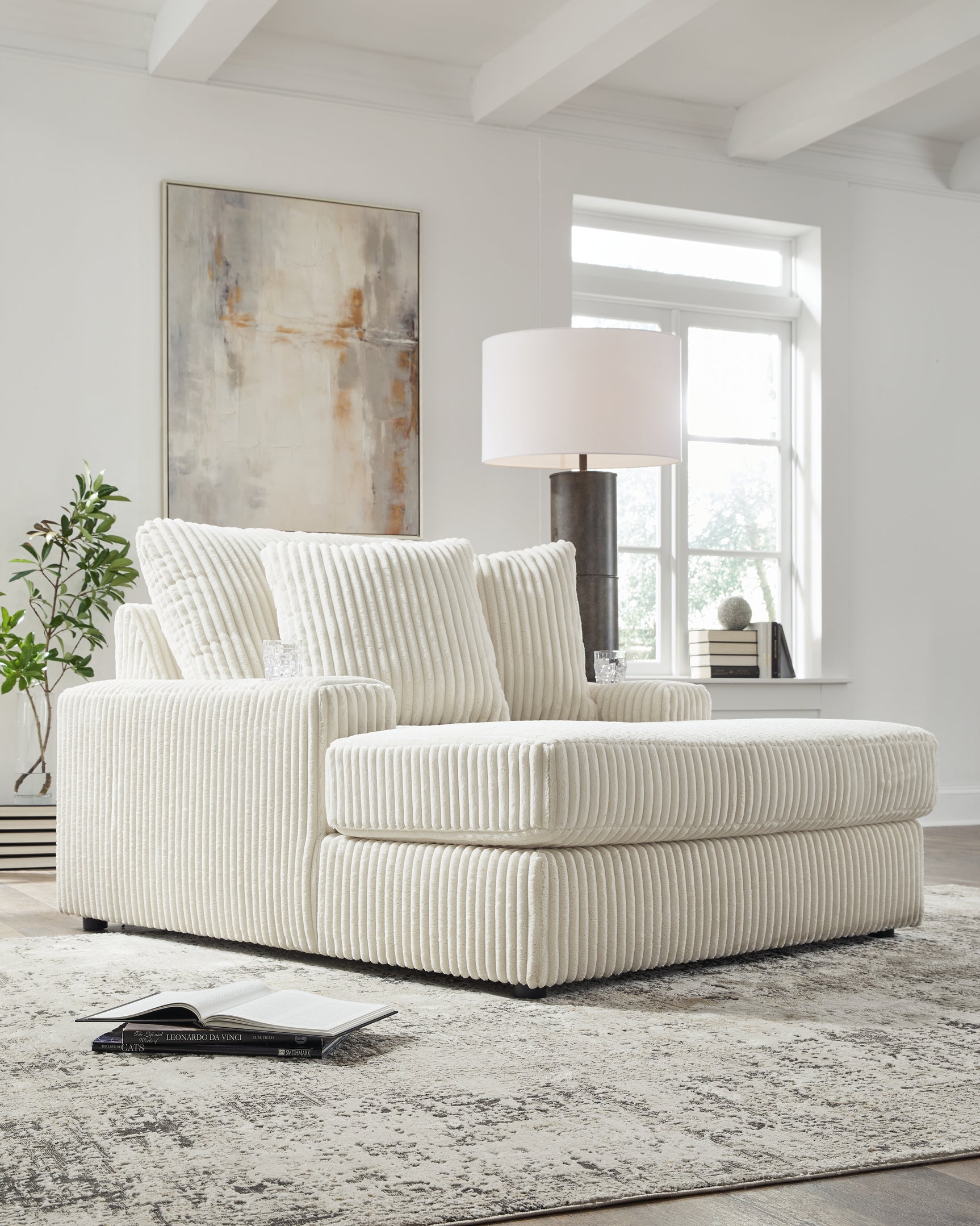Detailed view of USB charging port on Lindyn Ivory Velvet Chaise