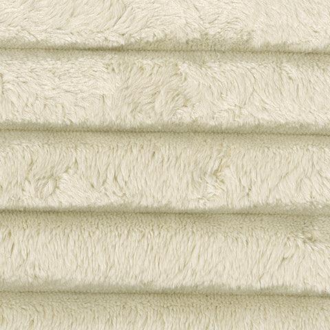 Close-up detail of Lindyn Ivory 3-Piece Sectional Sofa upholstery and texture