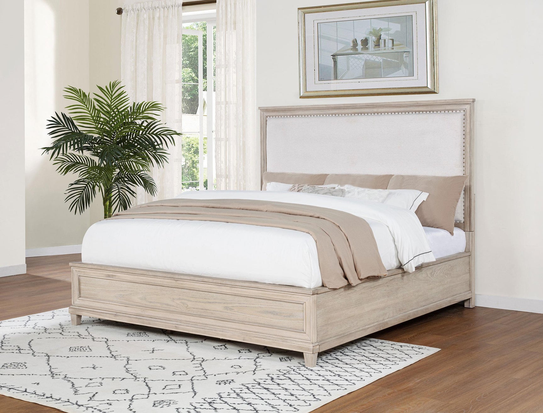 Side angle of Pembroke Eastern King panel bed showing nailhead trim