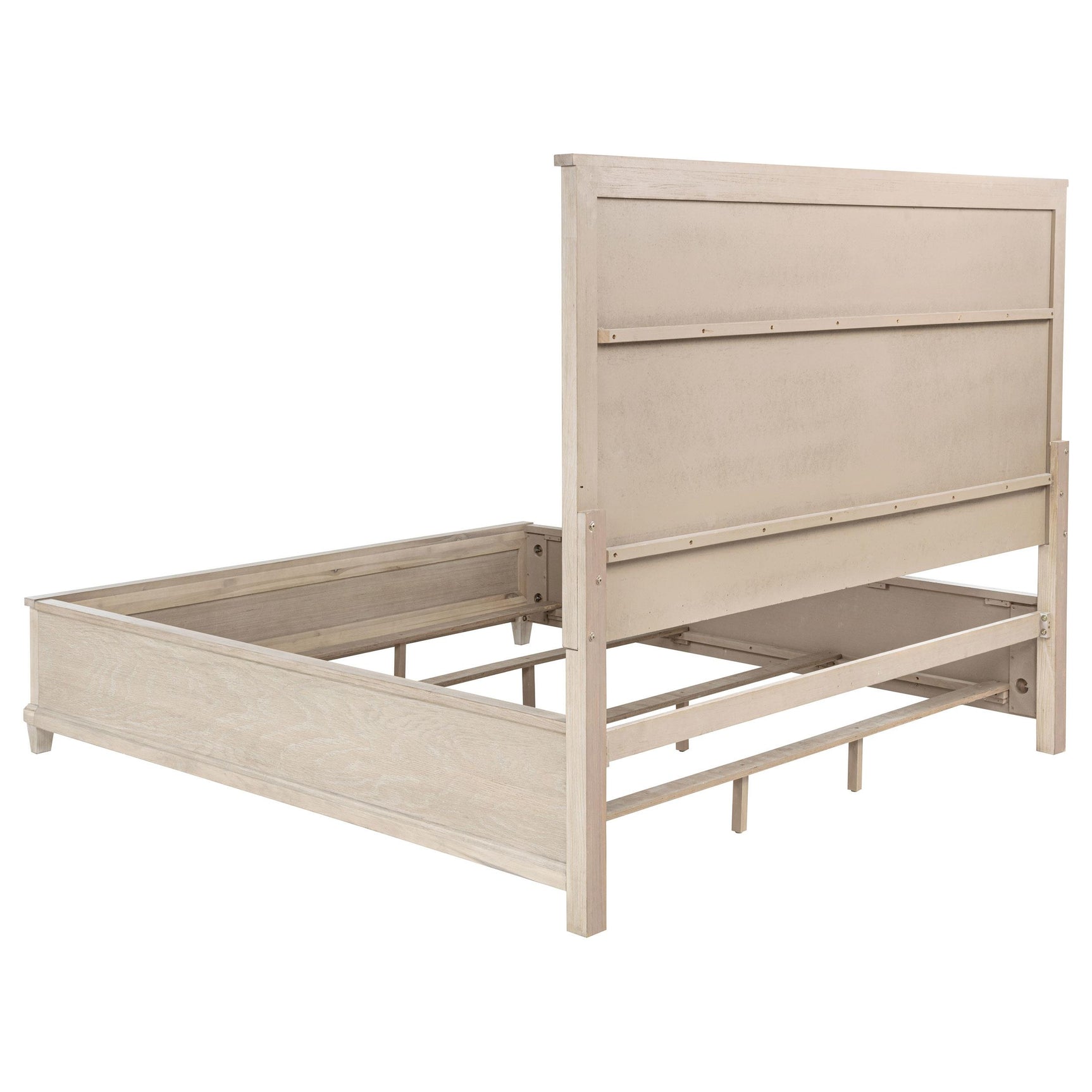 Top-down angle of bed frame corner in washed oak