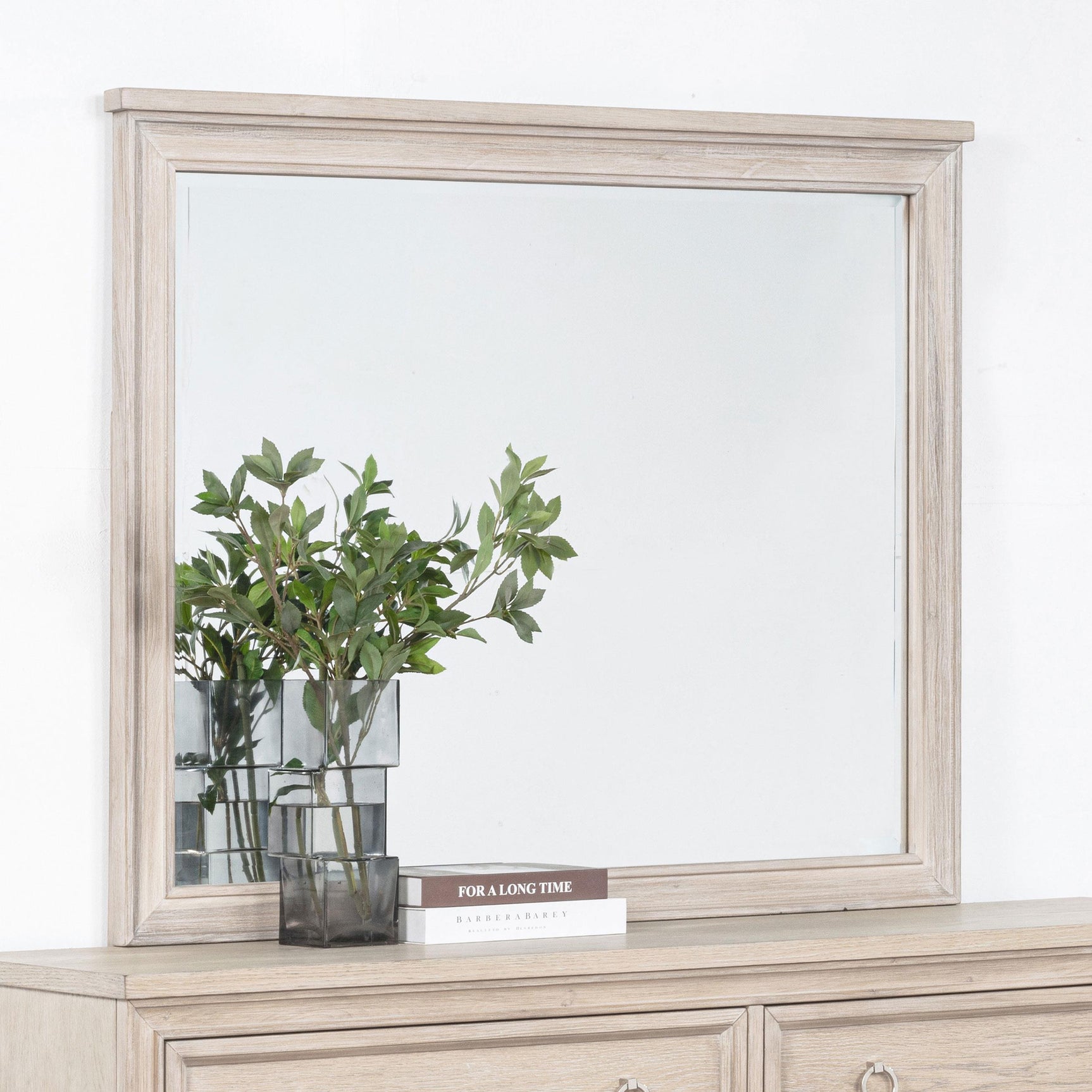 Close-up of washed oak frame and subtle molding detail