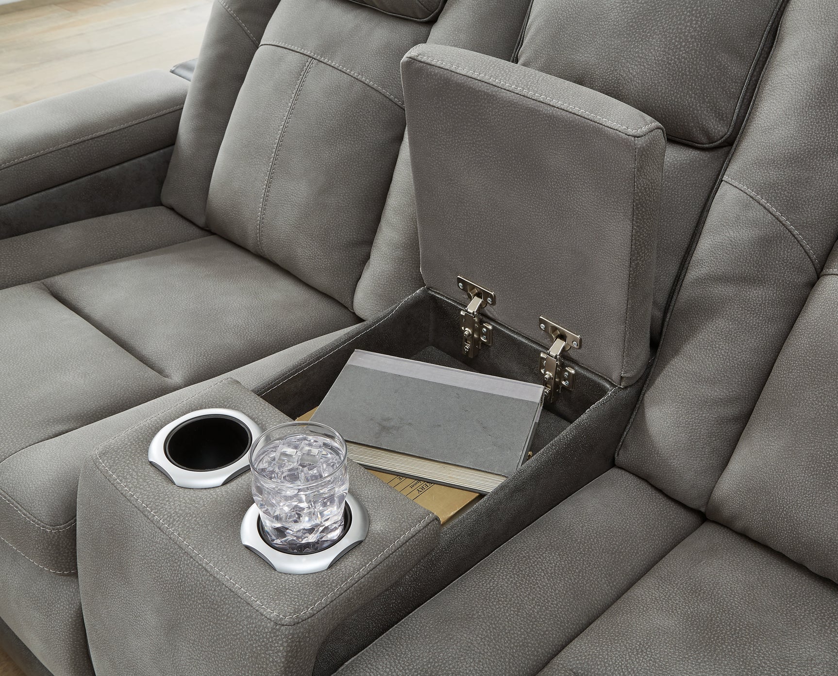 Console storage compartment open