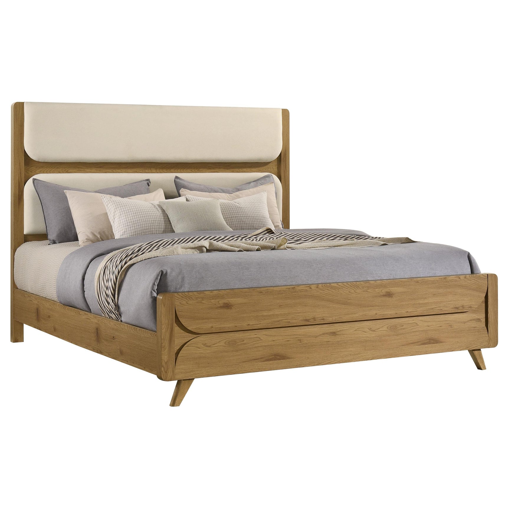 Close-up of padded cream upholstered headboard panels on Bennett bed