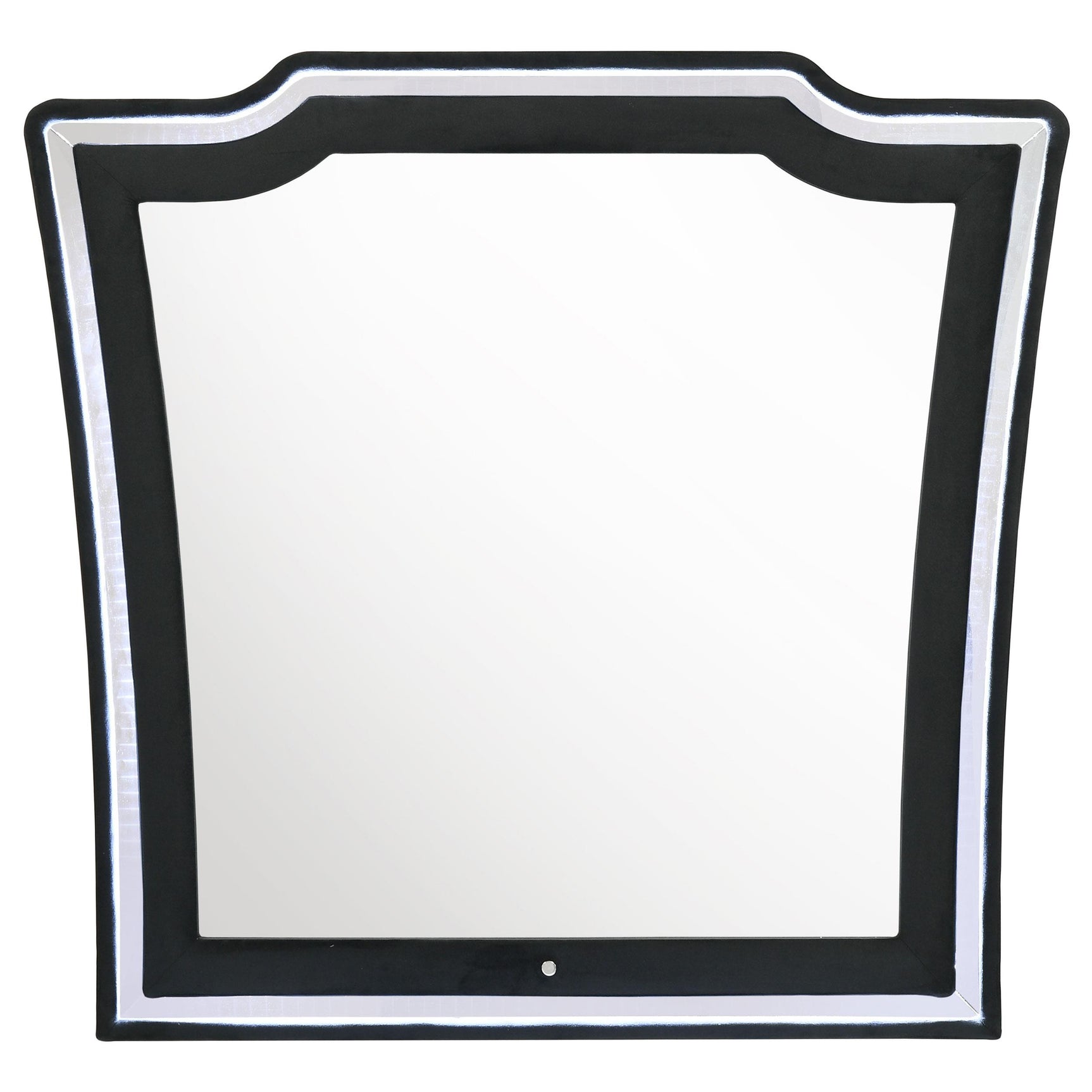 Close-up of black velvet fabric and foam padding on dresser mirror