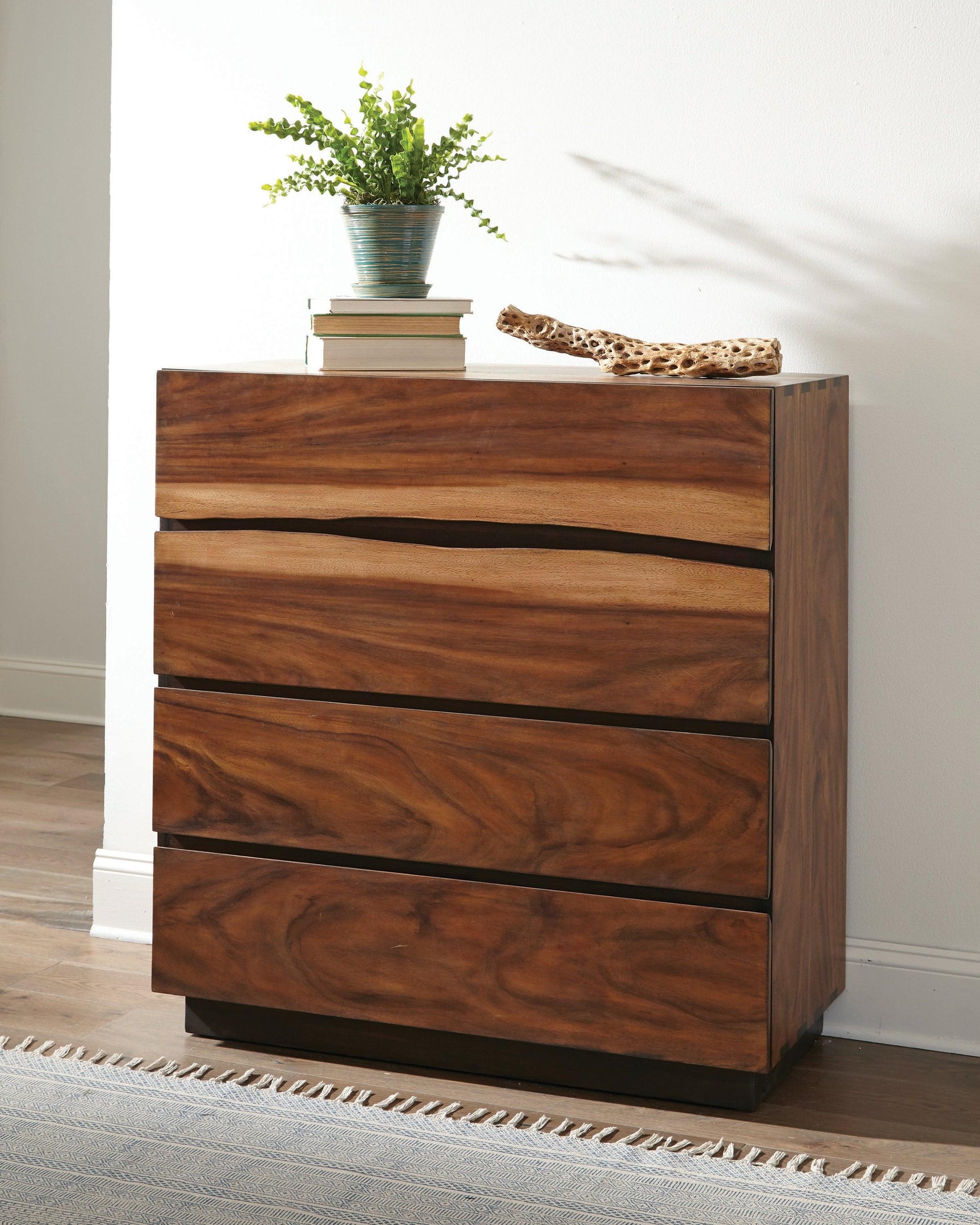 Four storage drawers on bed frame beneath mattress