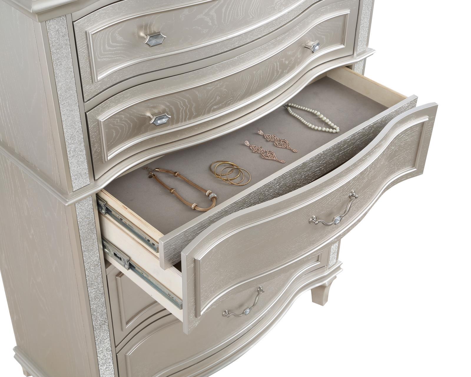 Drawer detail showing dovetail joinery and metal glides