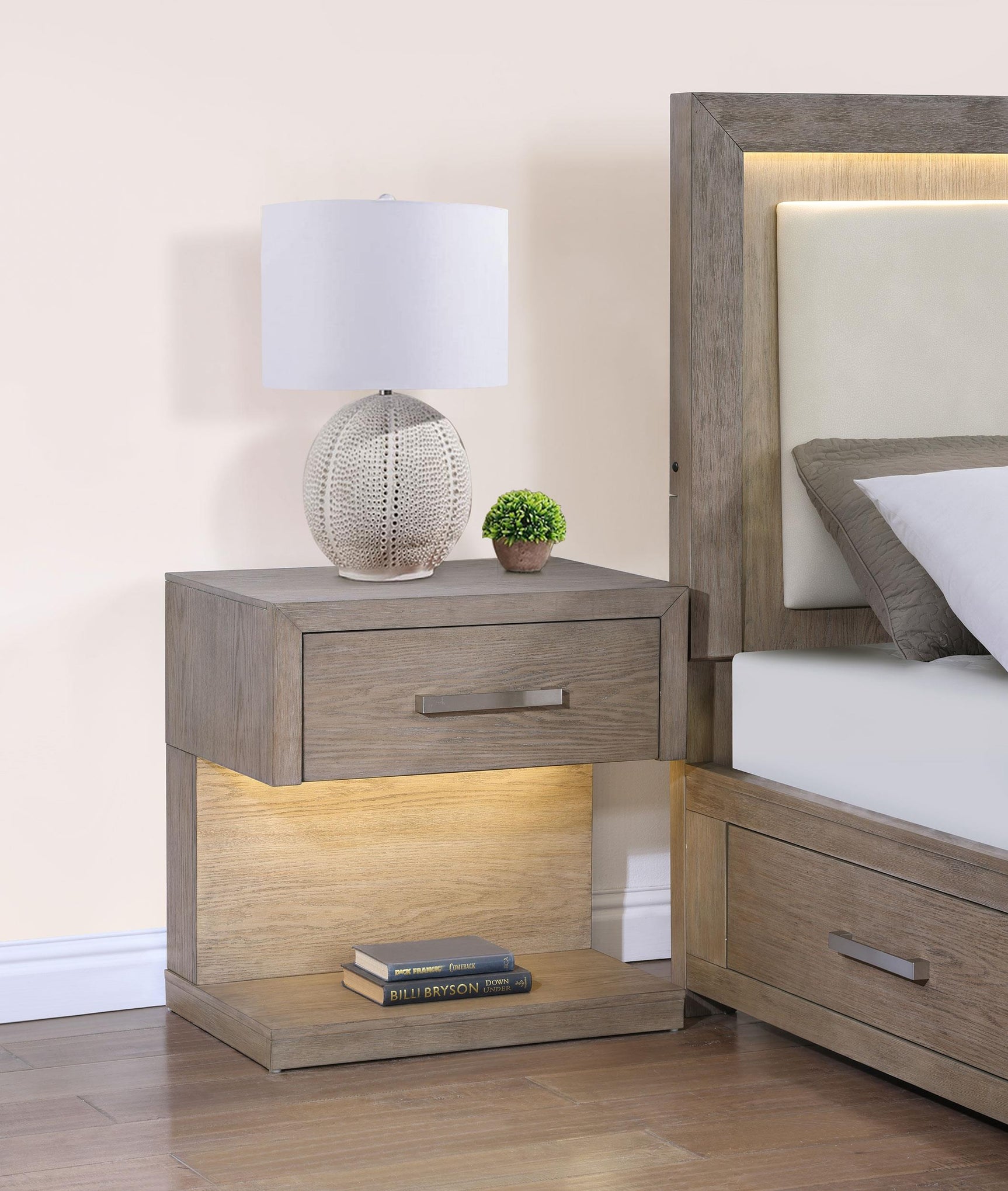 Side angle of Kenora nightstand showcasing LED lighting under tabletop