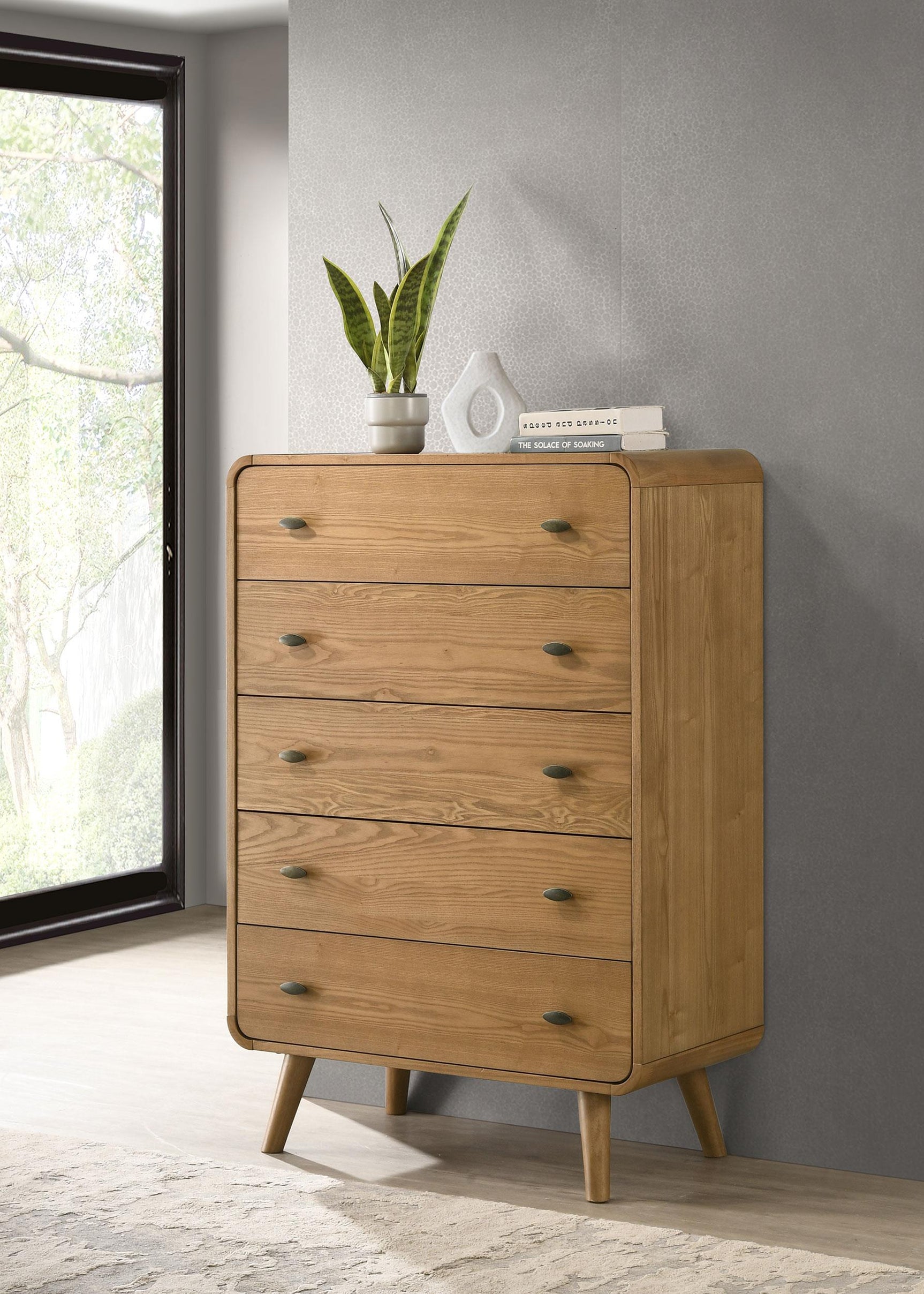 Robyn 5-drawer chest side view showing tapered legs