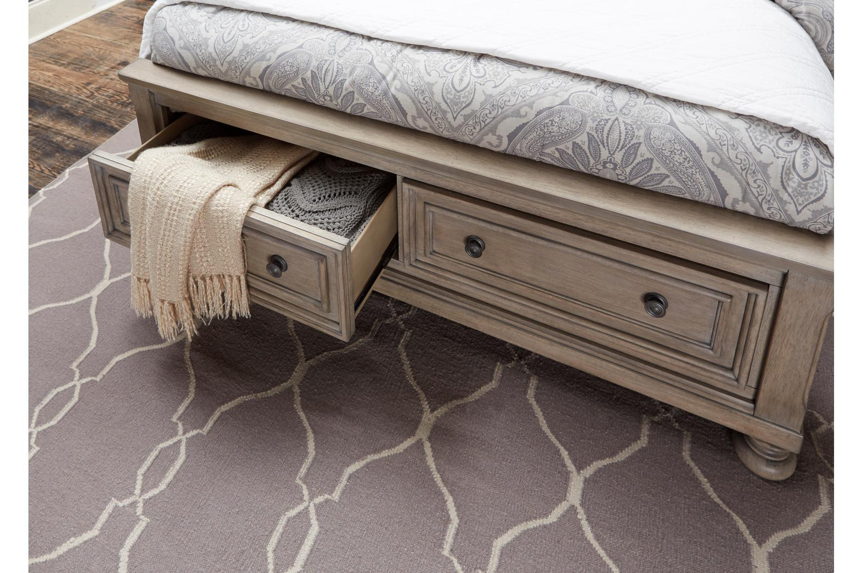 Side angle showing bed storage drawers in Bethel set