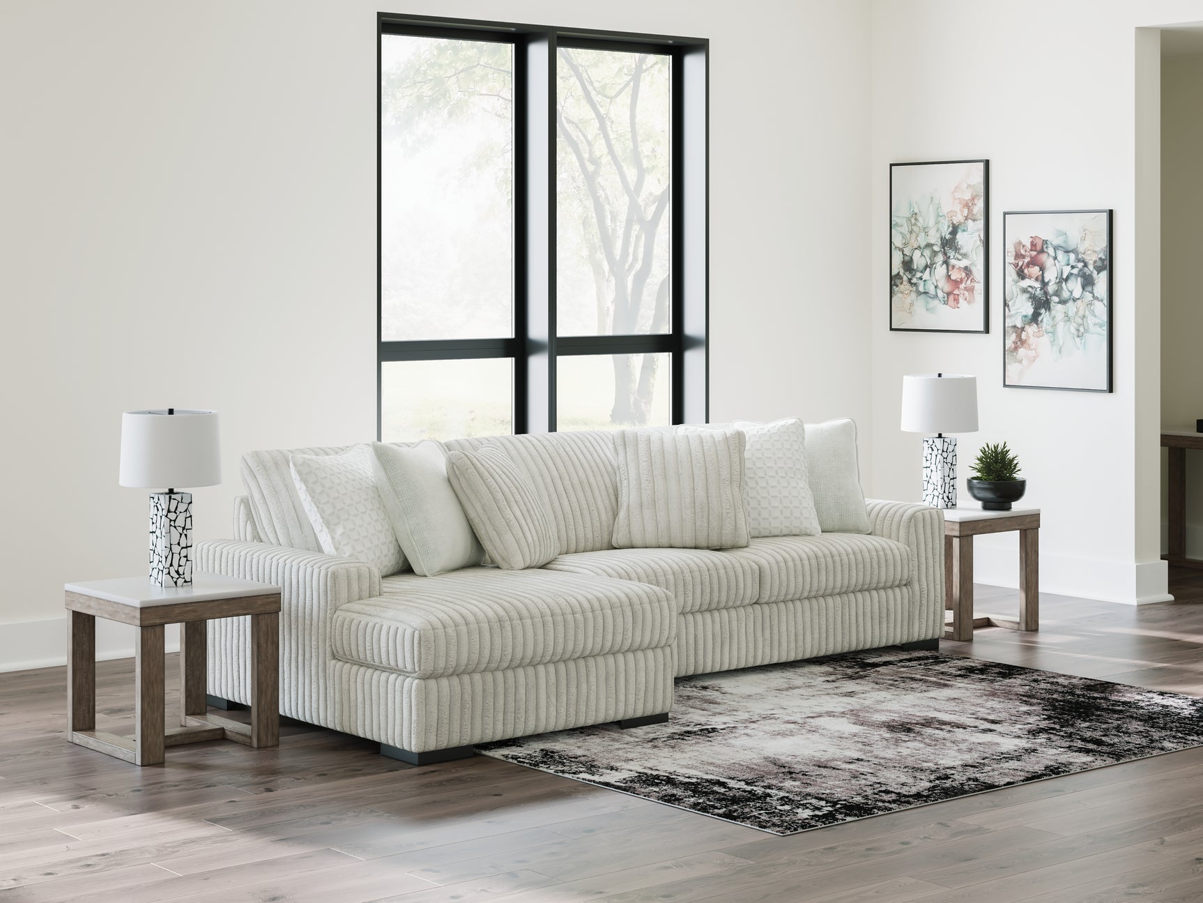 Side angle showing sectional sofa layout with chaise