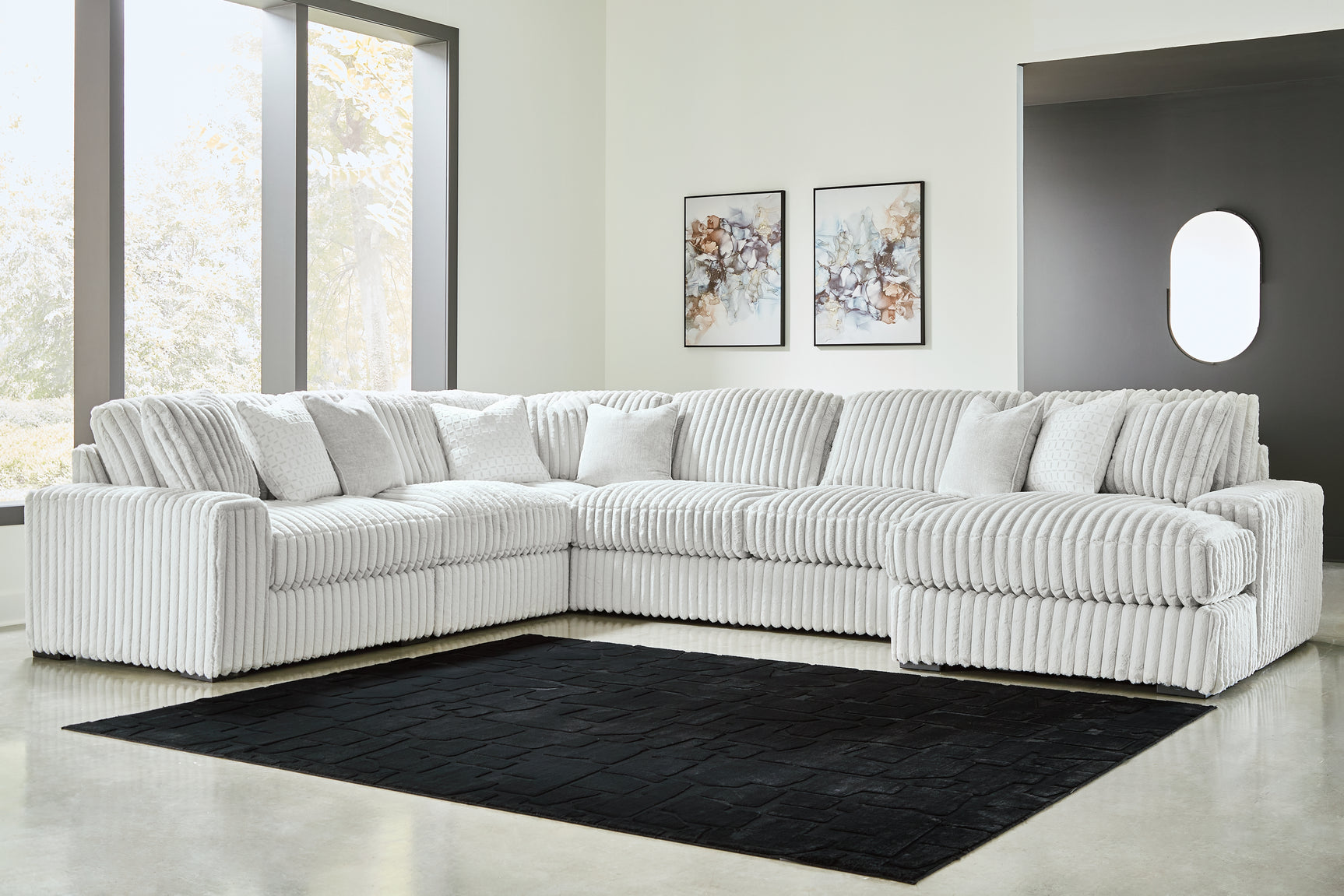 Side angle showing chaise of Stupendous Alloy 6-Piece Sectional with Chaise sectional sofa