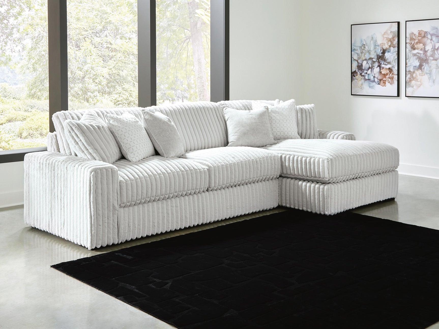 Close-up detail of alloy velvet upholstery on sectional sofa