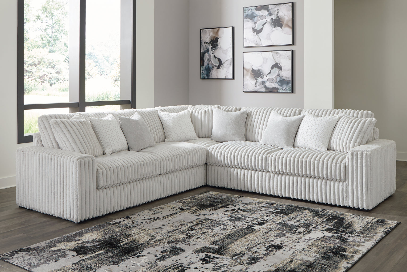 Living room setup with Stupendous Alloy 3-Piece Sectional