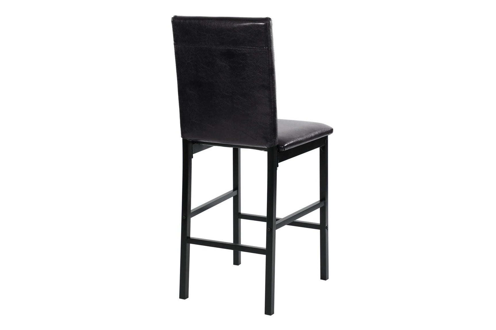 angled view of table and chairs in room setting