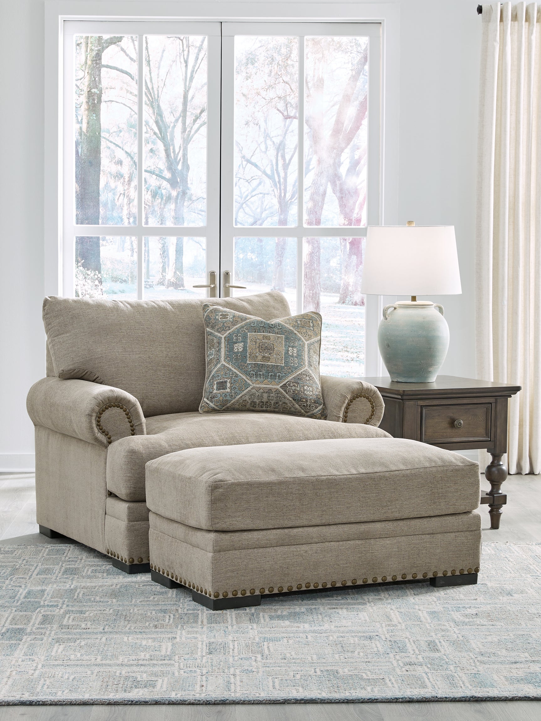 Galemore Quarry Chair side view with rolled arms and nailhead trim