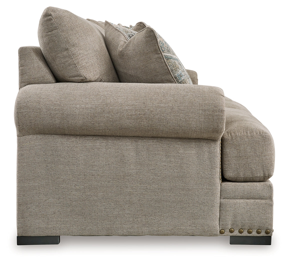 Side angle of chair with padded arms