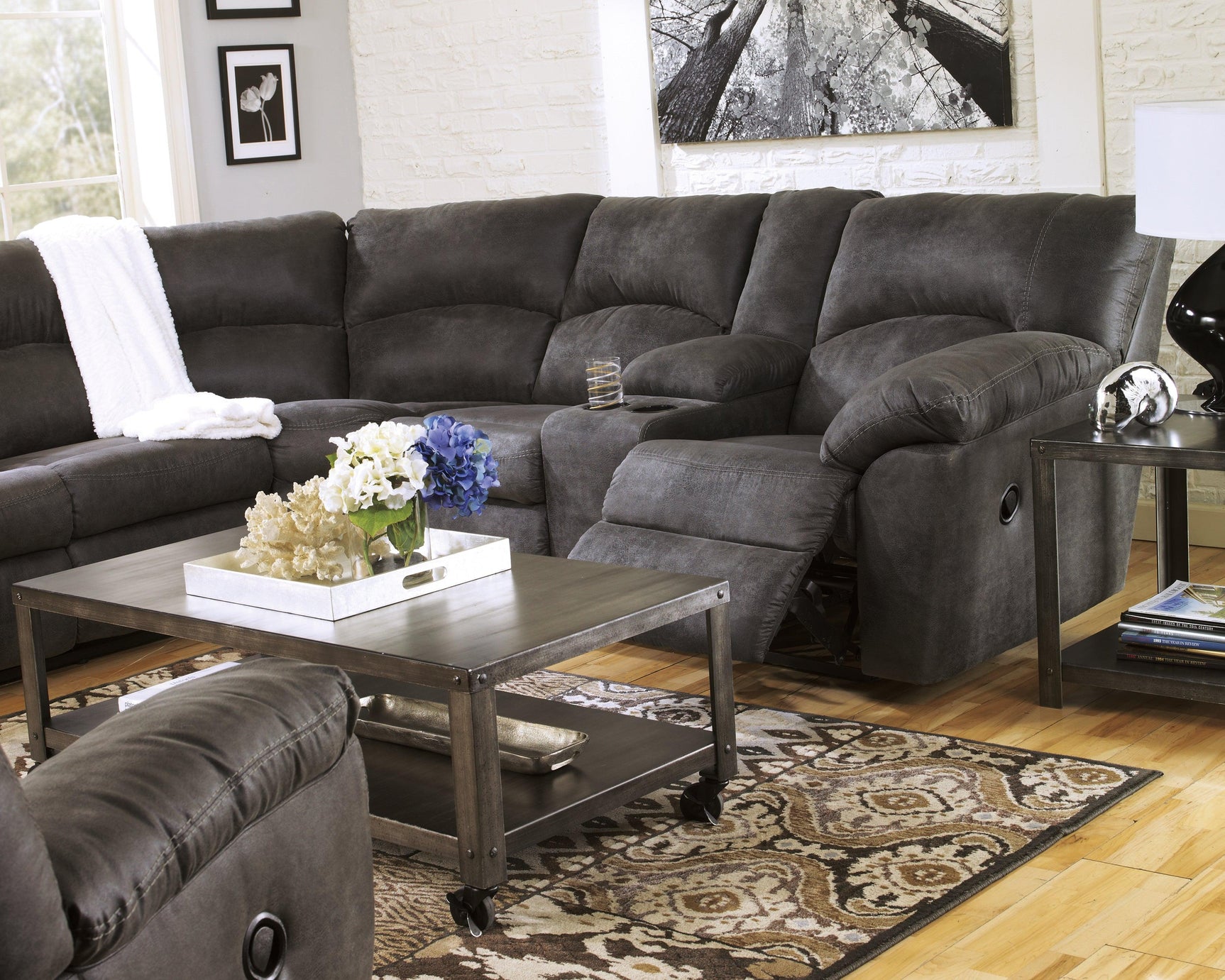 Sectional shown reclined with footrest extended
