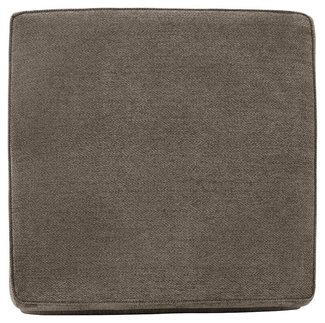 Ottoman presenting removable cushioned top