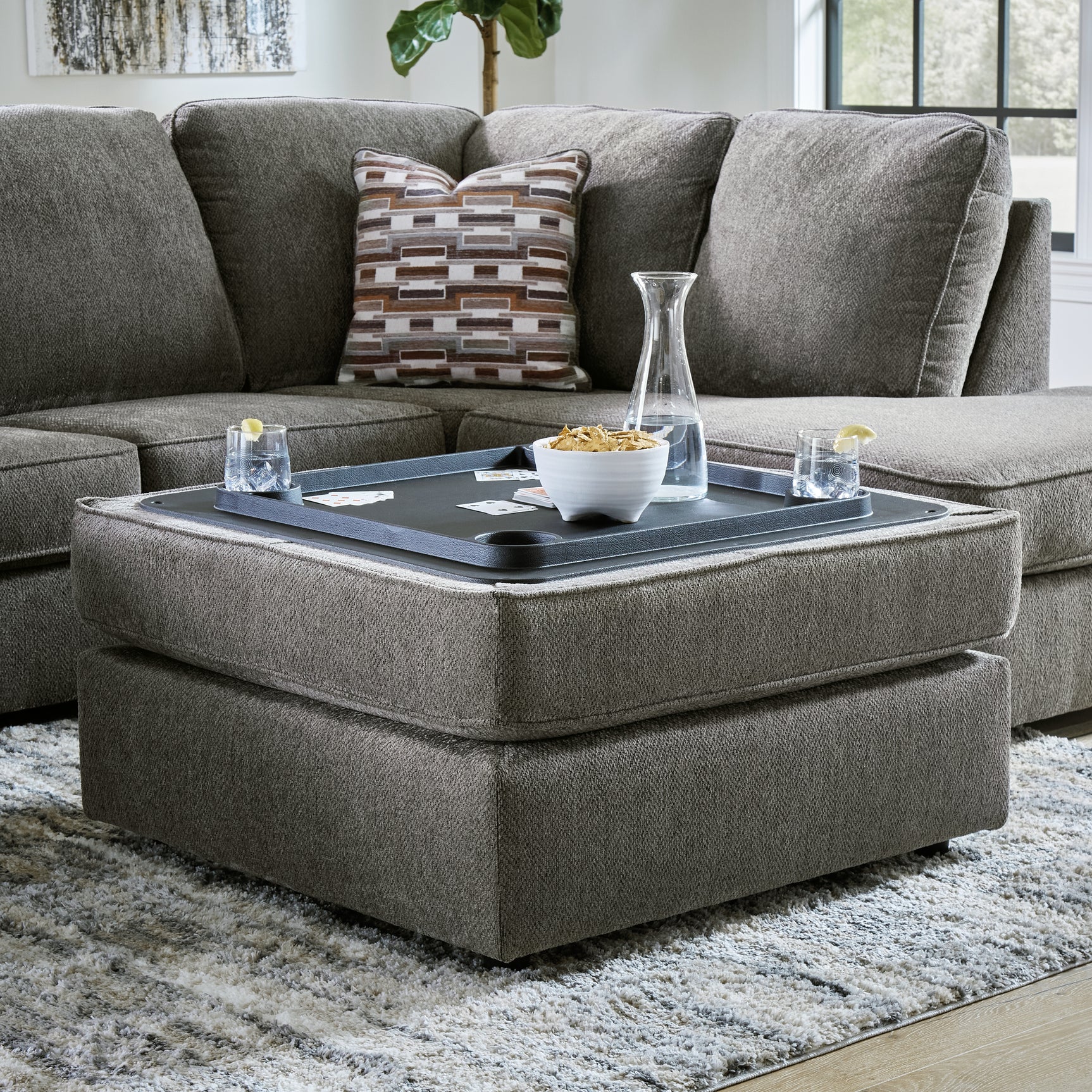 Detail of sectional sofa tray accessory