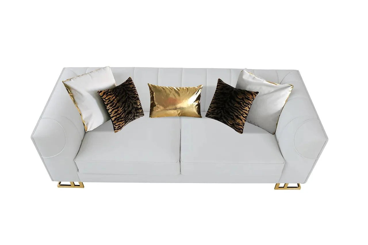 Side angle of loveseat showing gold accents