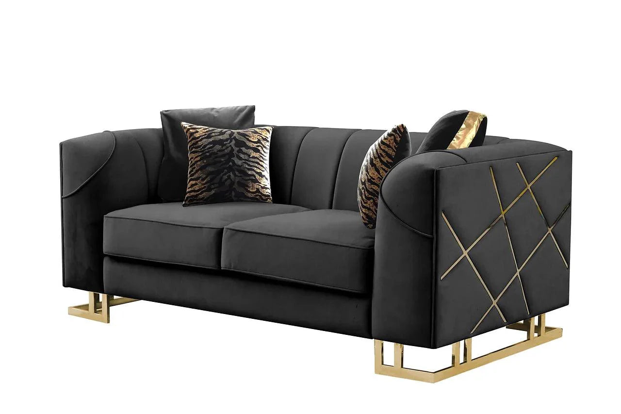 Black velvet chair with gold metallic legs, room setting