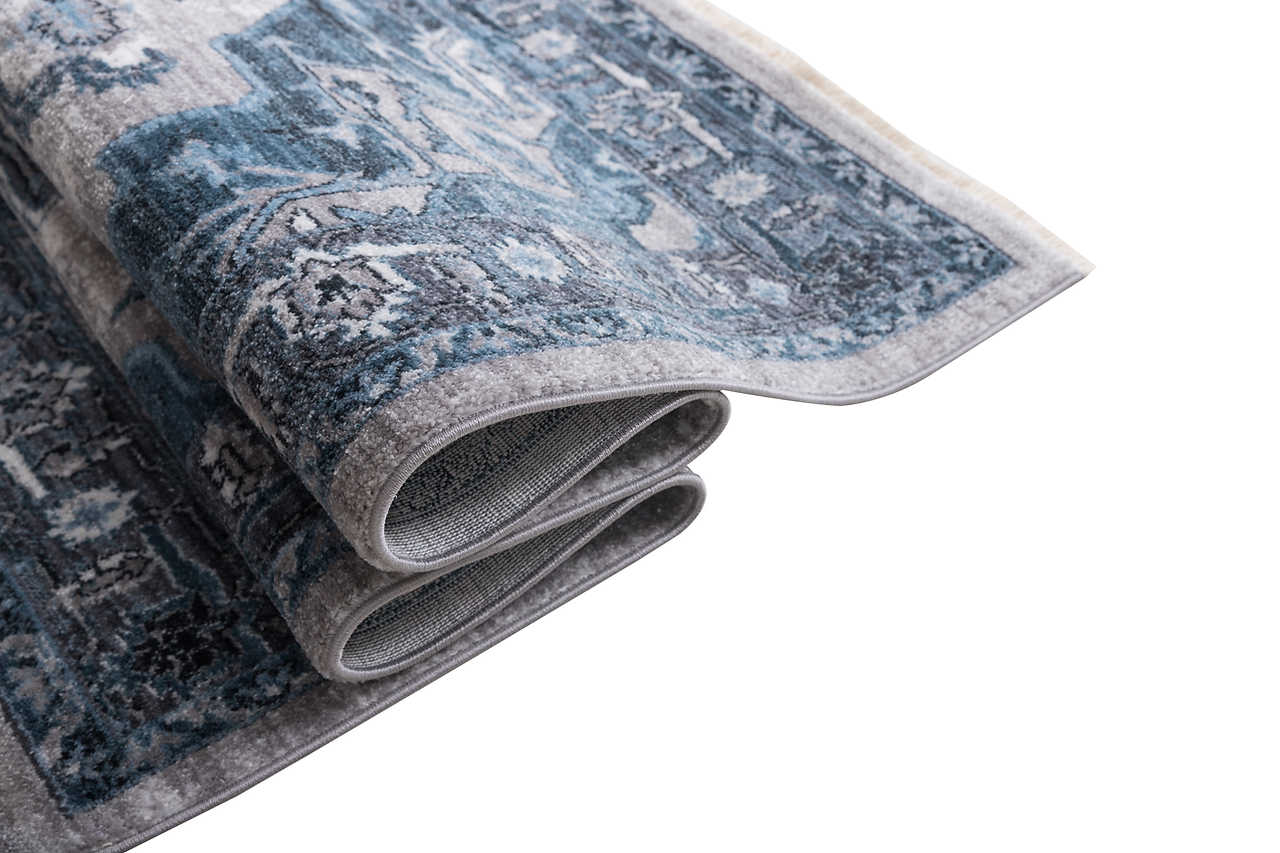 Close-up of Ashton Glacier teal and blue rug texture