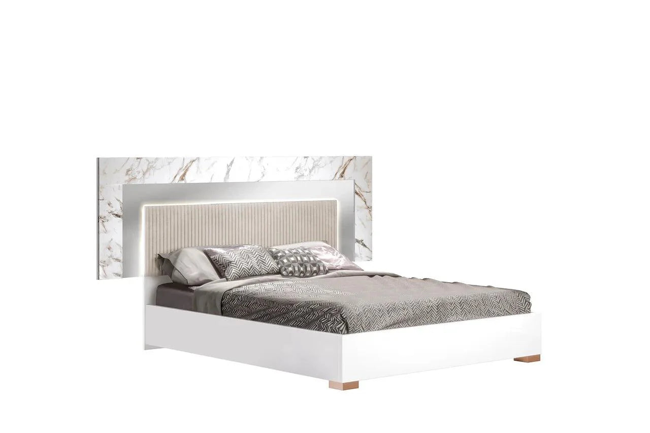Side view of Cruz White Gray LED Bedroom Set bed showing LED lighting