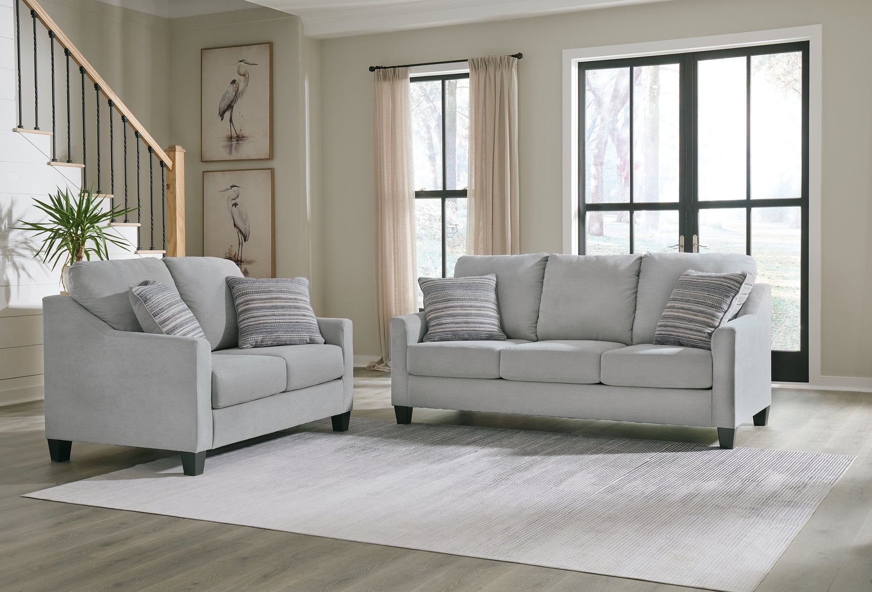 Side view of Adlai Shadow Sofa and Loveseat set in shadow gray
