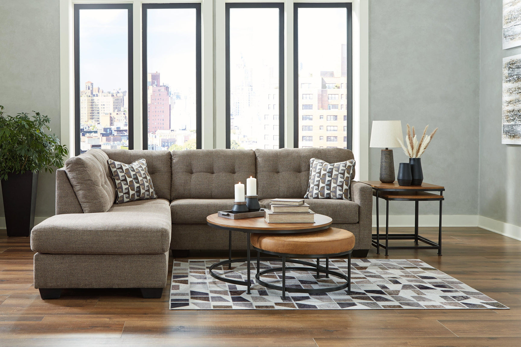 room view of Mahoney Chocolate 2-Piece Sectional With Chaise sectional sofa