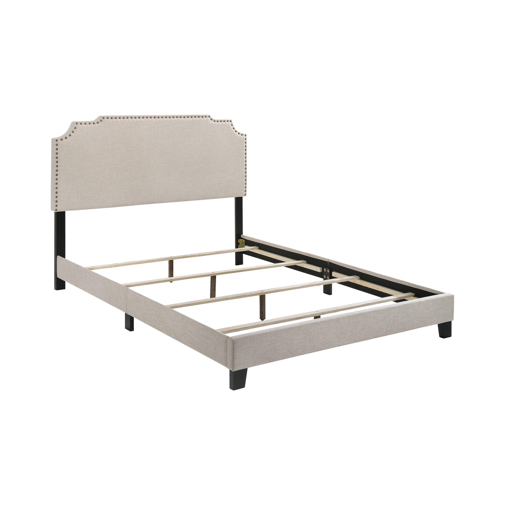 Detailed view of nailhead trim on Tamarac Beige Upholstered Full Bed headboard
