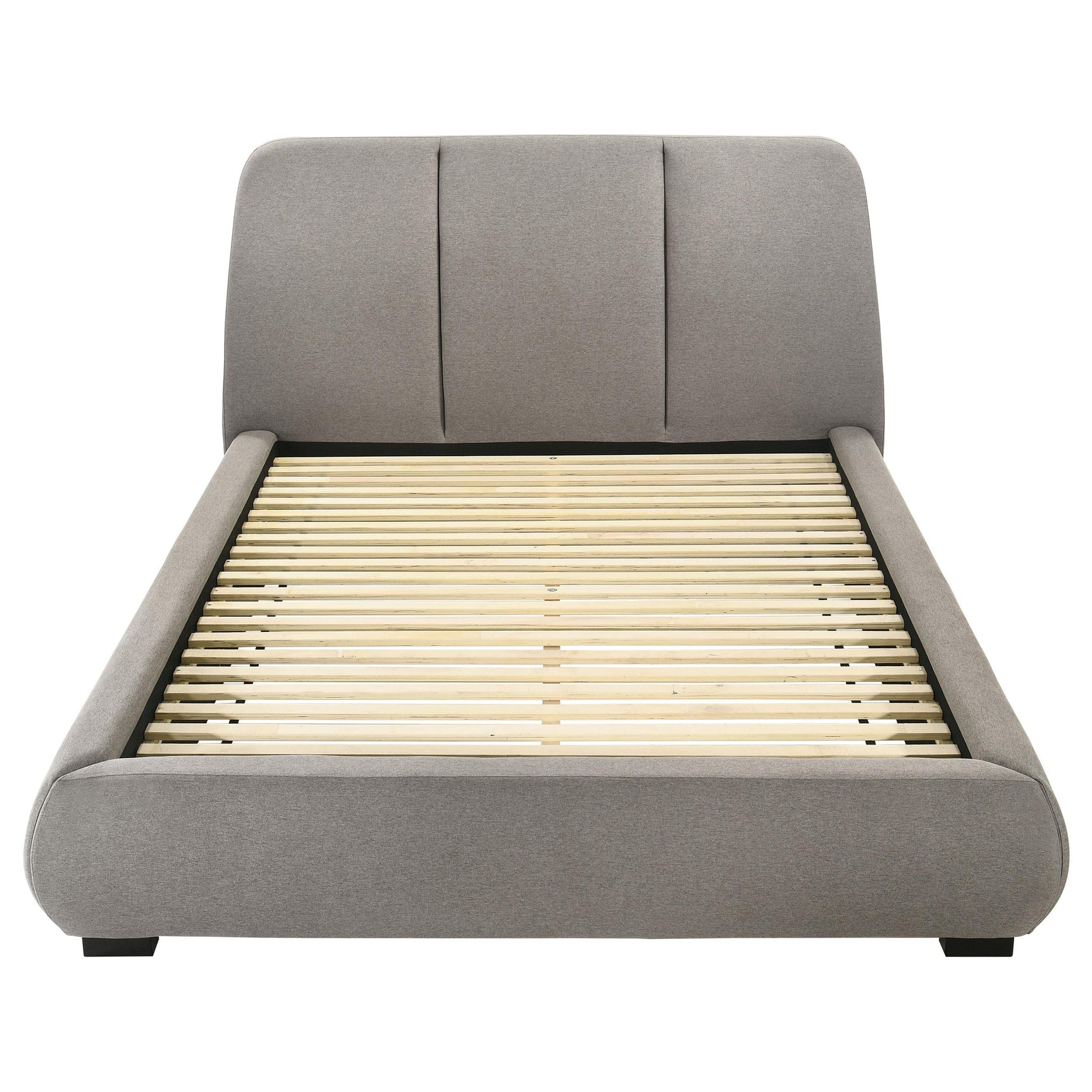 Rounded side rail detail of taupe platform bed