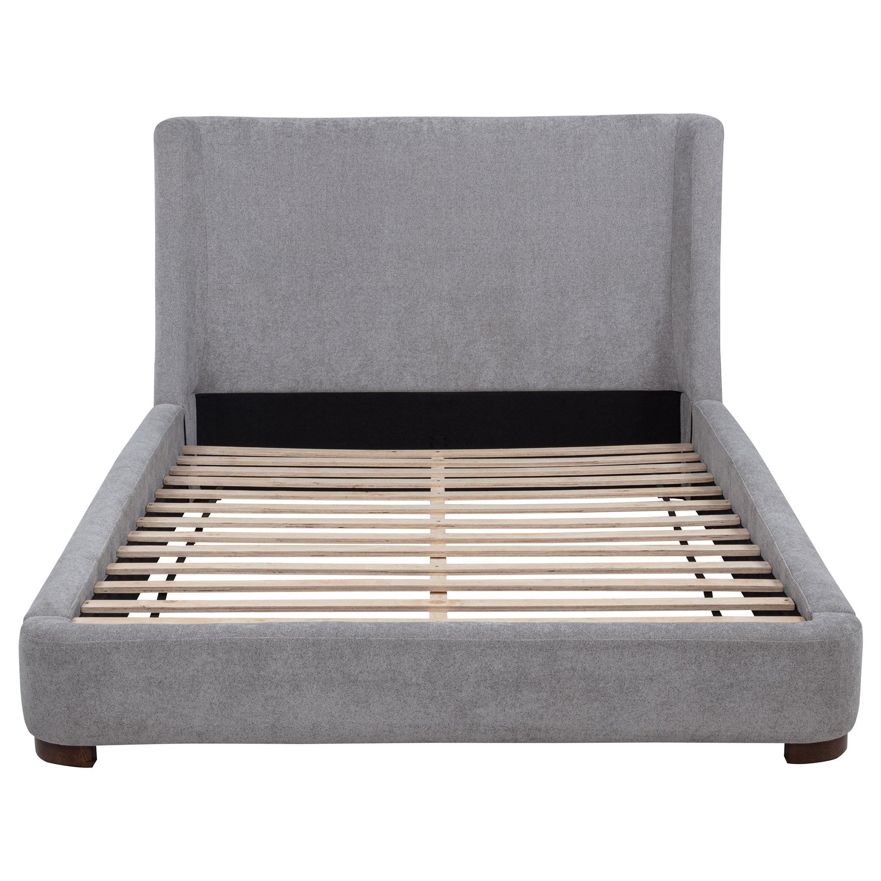 Detail of walnut-toned rubberwood legs on Rennes bed