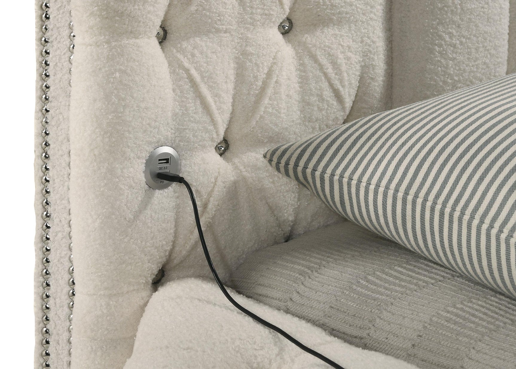 Rounded headboard shape in ivory upholstery