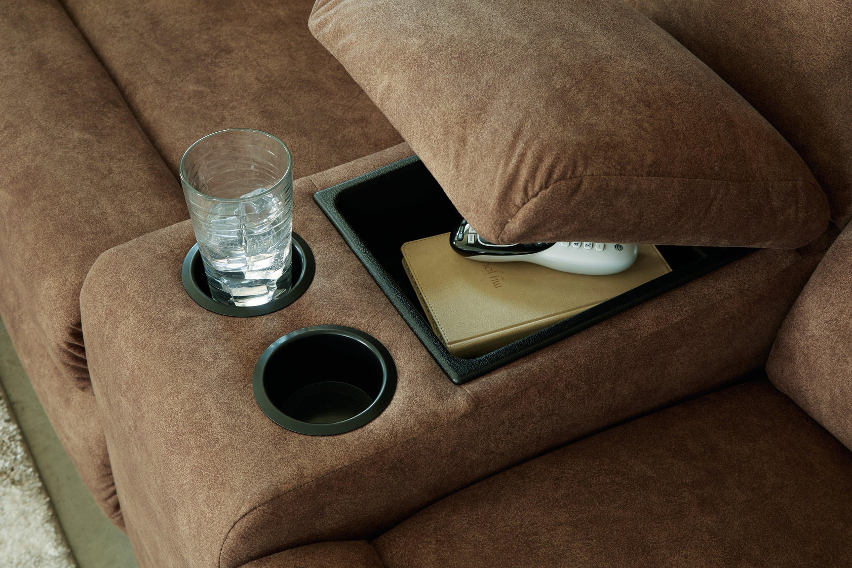 Console detail with cup holders and storage in Partymate Sectional