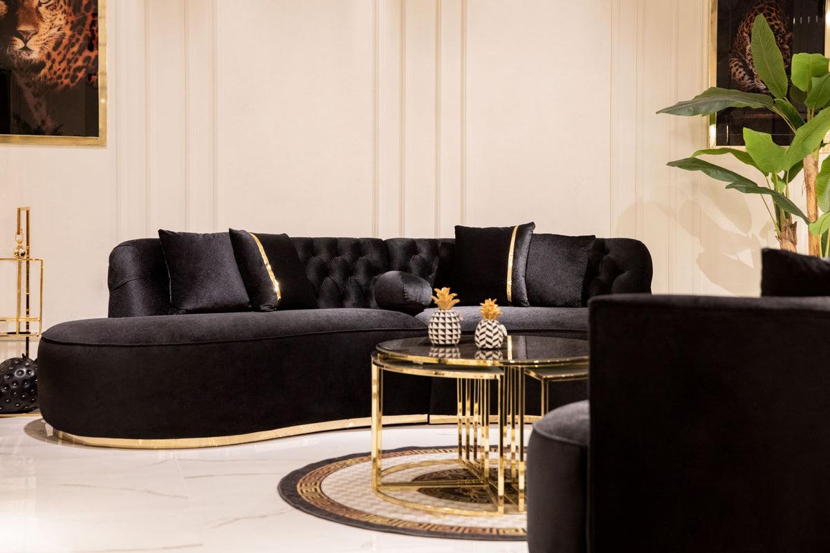 Living room setting with Sophia Black Velvet Curved Sectional sofa