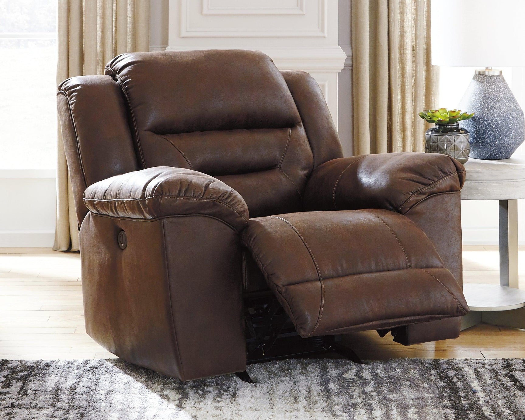 Front angle of Stoneland Chocolate Faux Leather Power Recliner