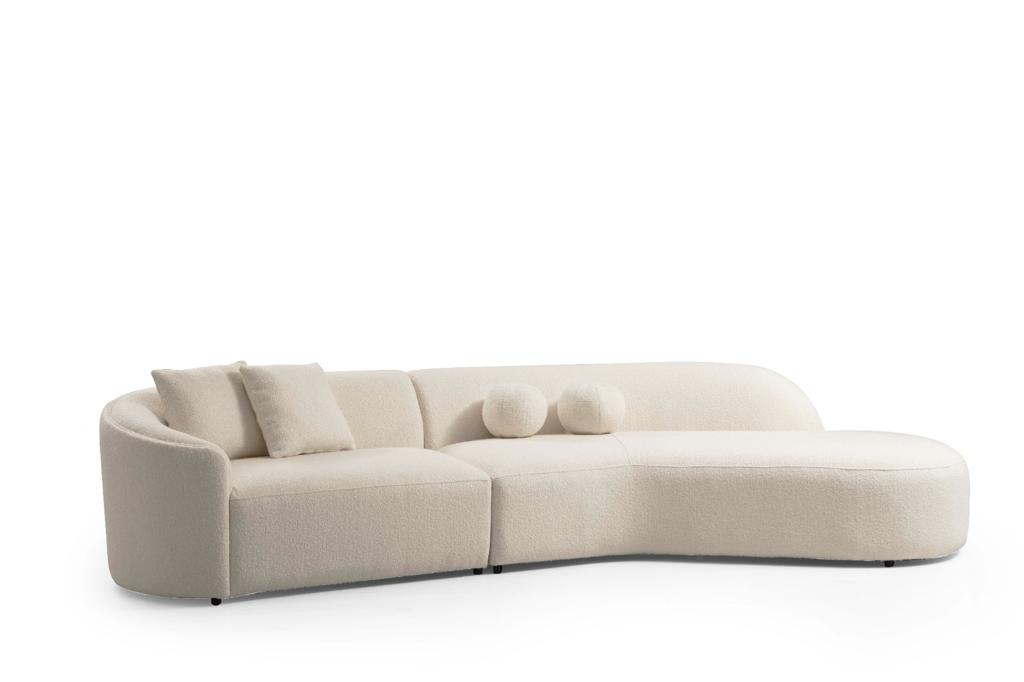 Side view of Ava Ivory Boucle Curved 134" RAF Sectional sofa
