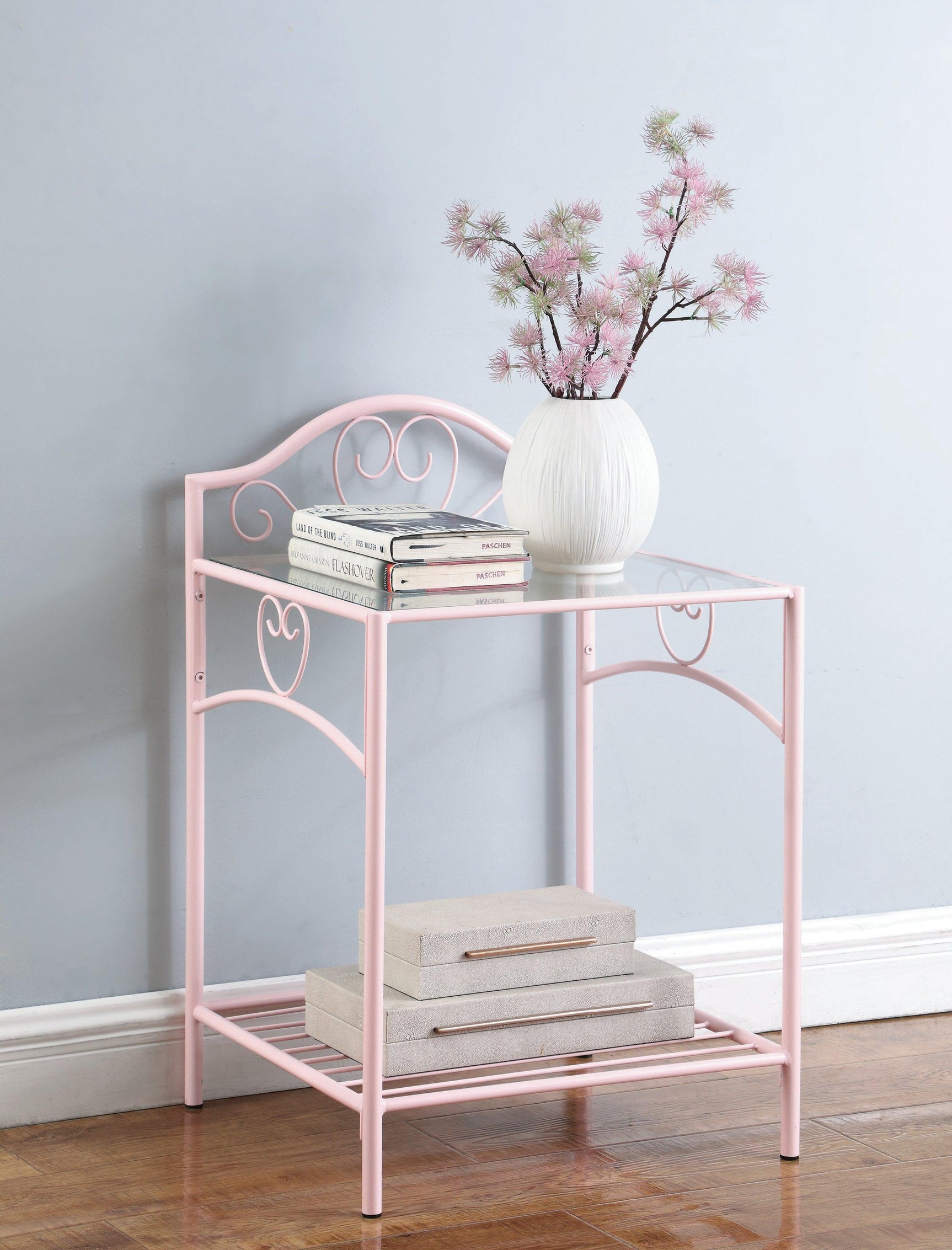 Tufted pink upholstered bench in bedroom setting