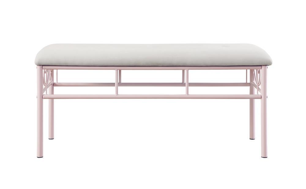 Close-up of tufted powder pink fabric upholstery on bench