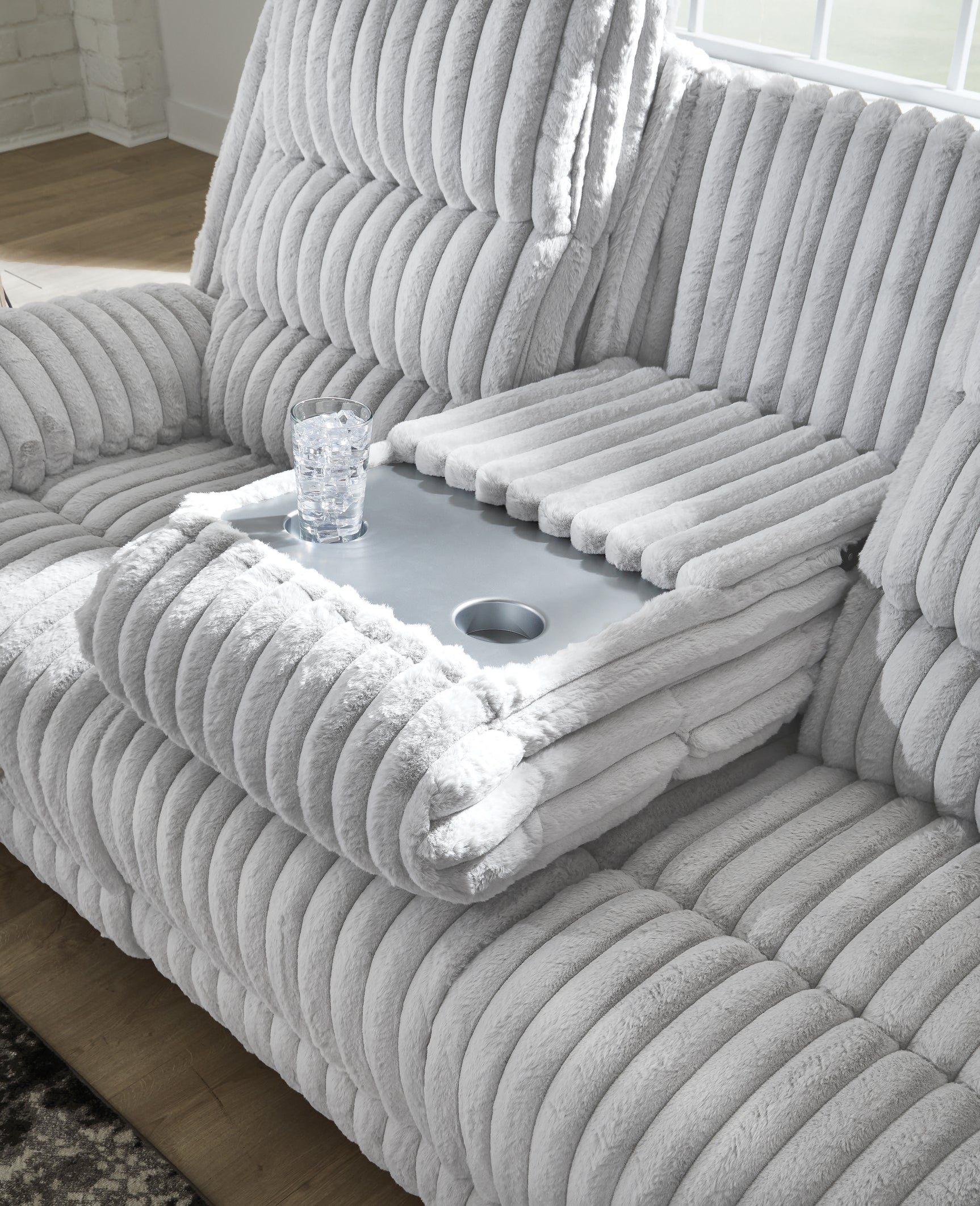 Drop-down table with cup holders detail