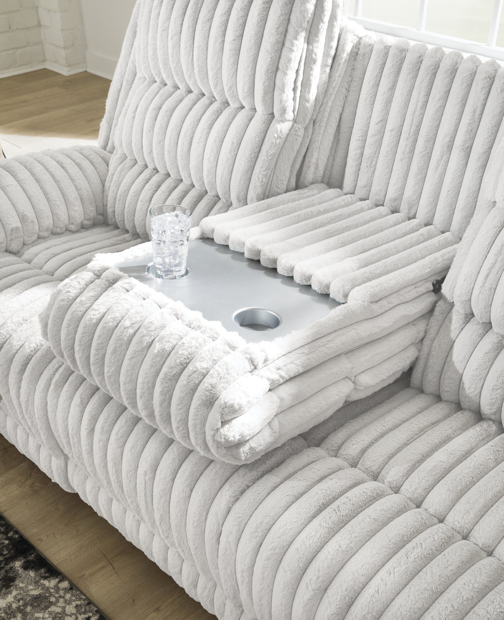 Detail of pillowy cushions on Alloy Falls sofa