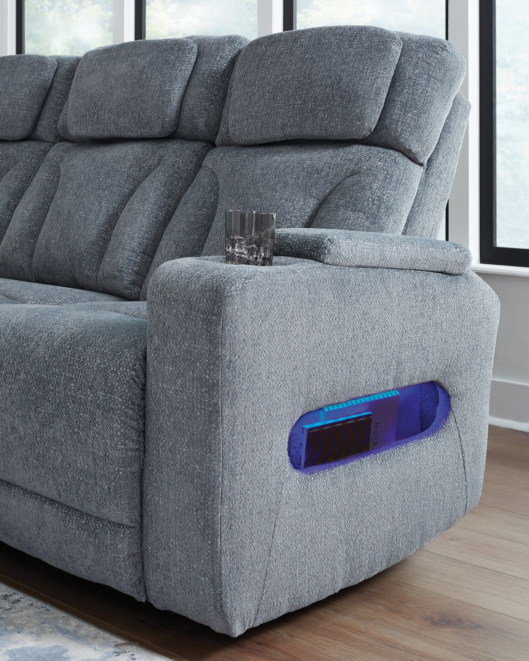 Side detail of sofa upholstery and armrest