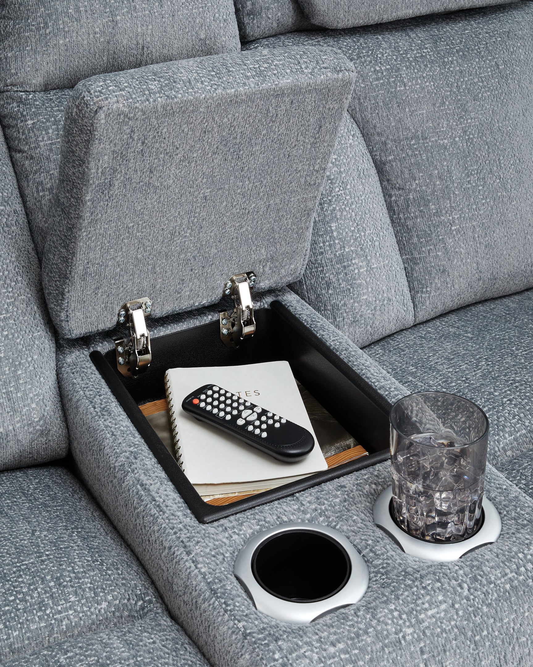 Cup holder and storage compartment on sofa arm
