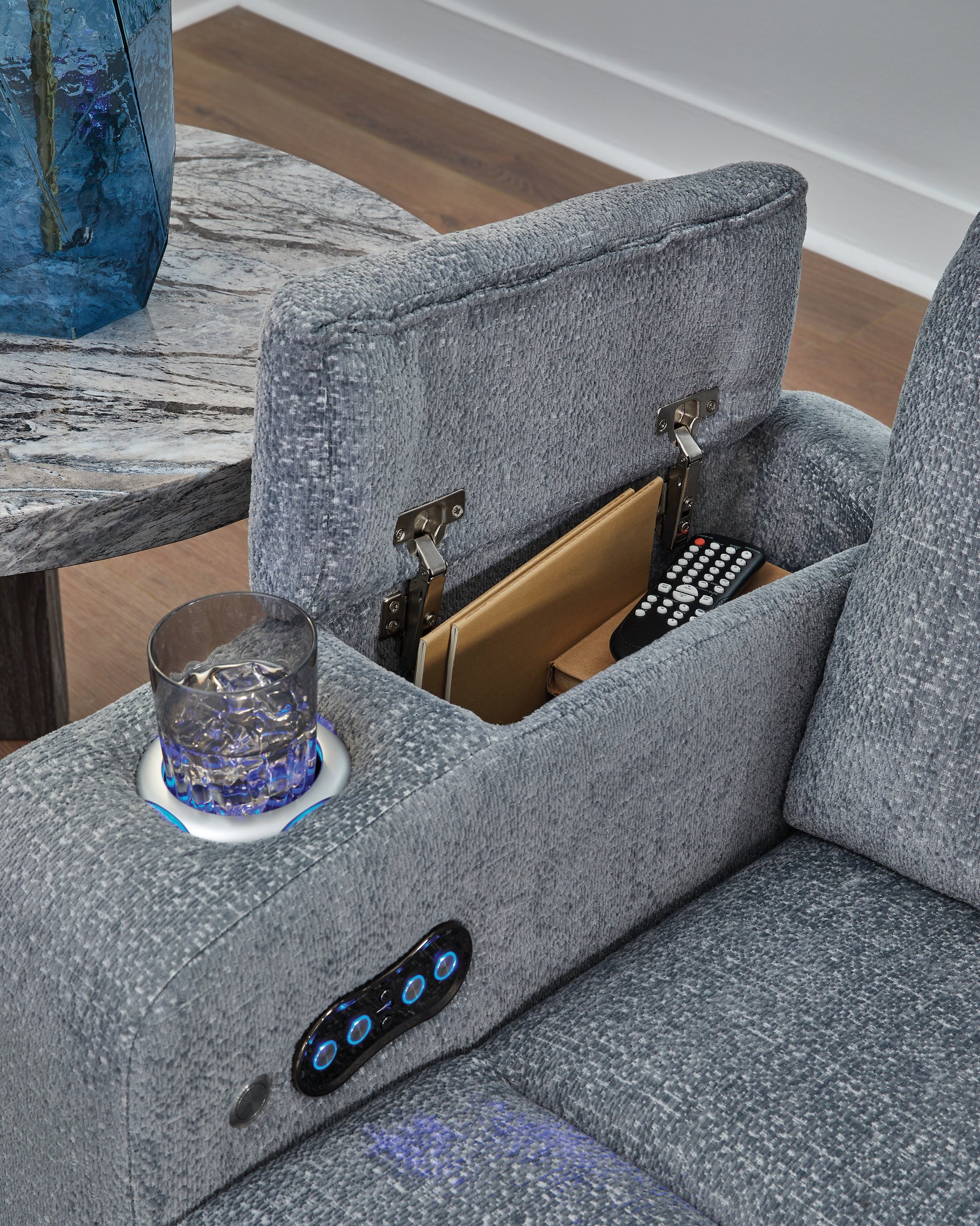 Armrest storage detail on Studio Cave Steel Power Recliner