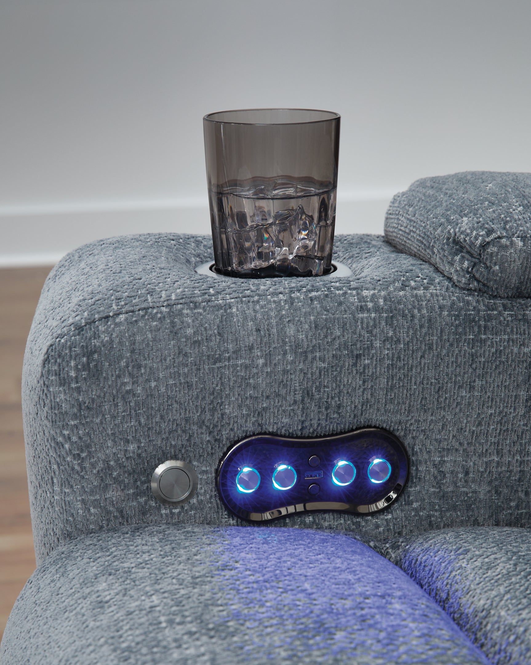 Side view highlighting USB port and control features